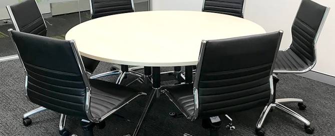 Round Meeting Table with Black Aria Medium Back Chairs